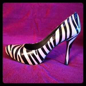 Zebra print pumps